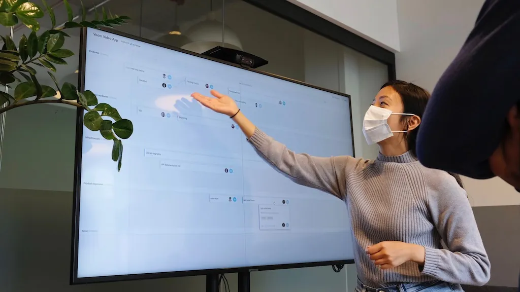 woman presenting on screen