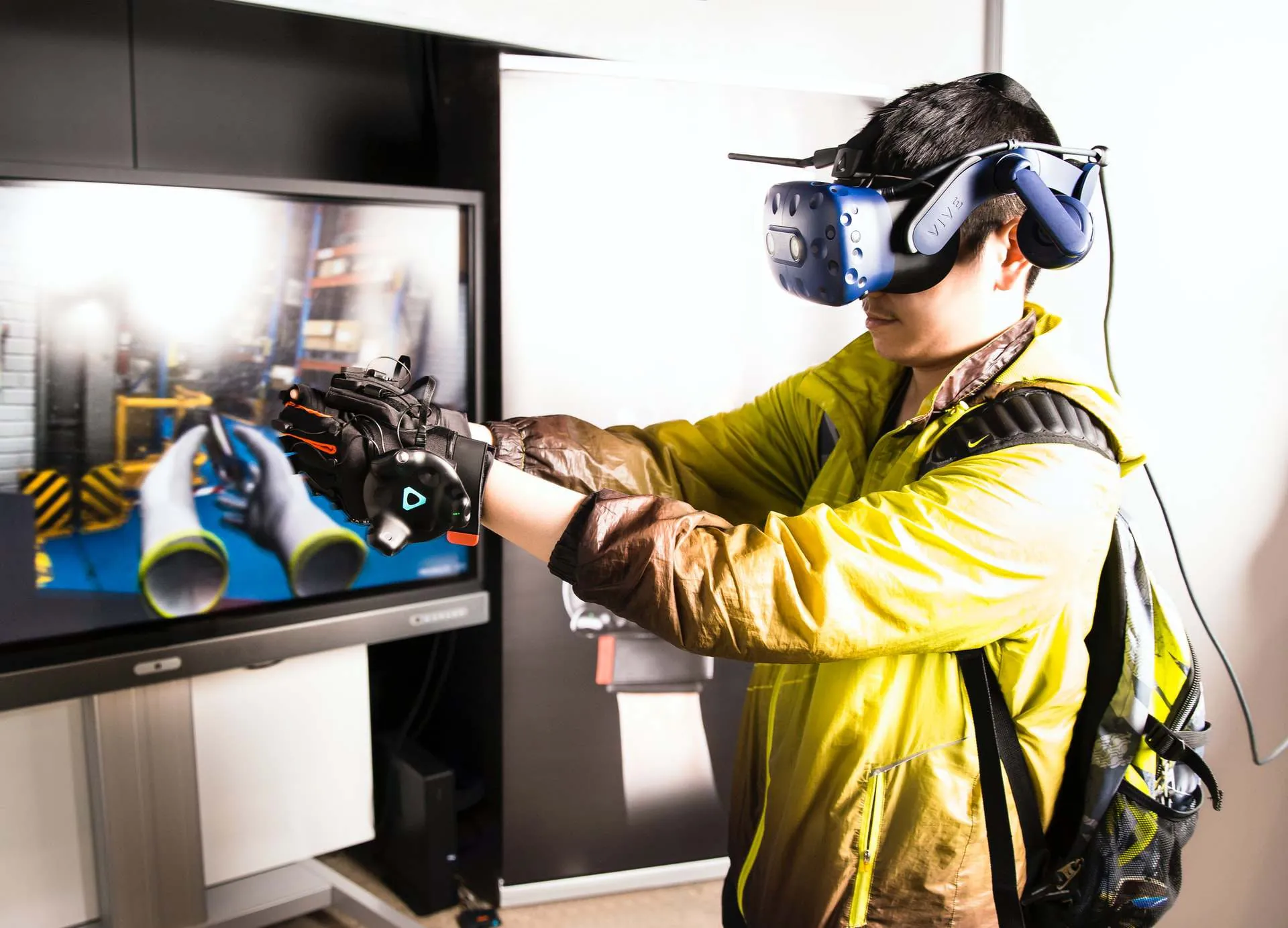 man using VR headset to train